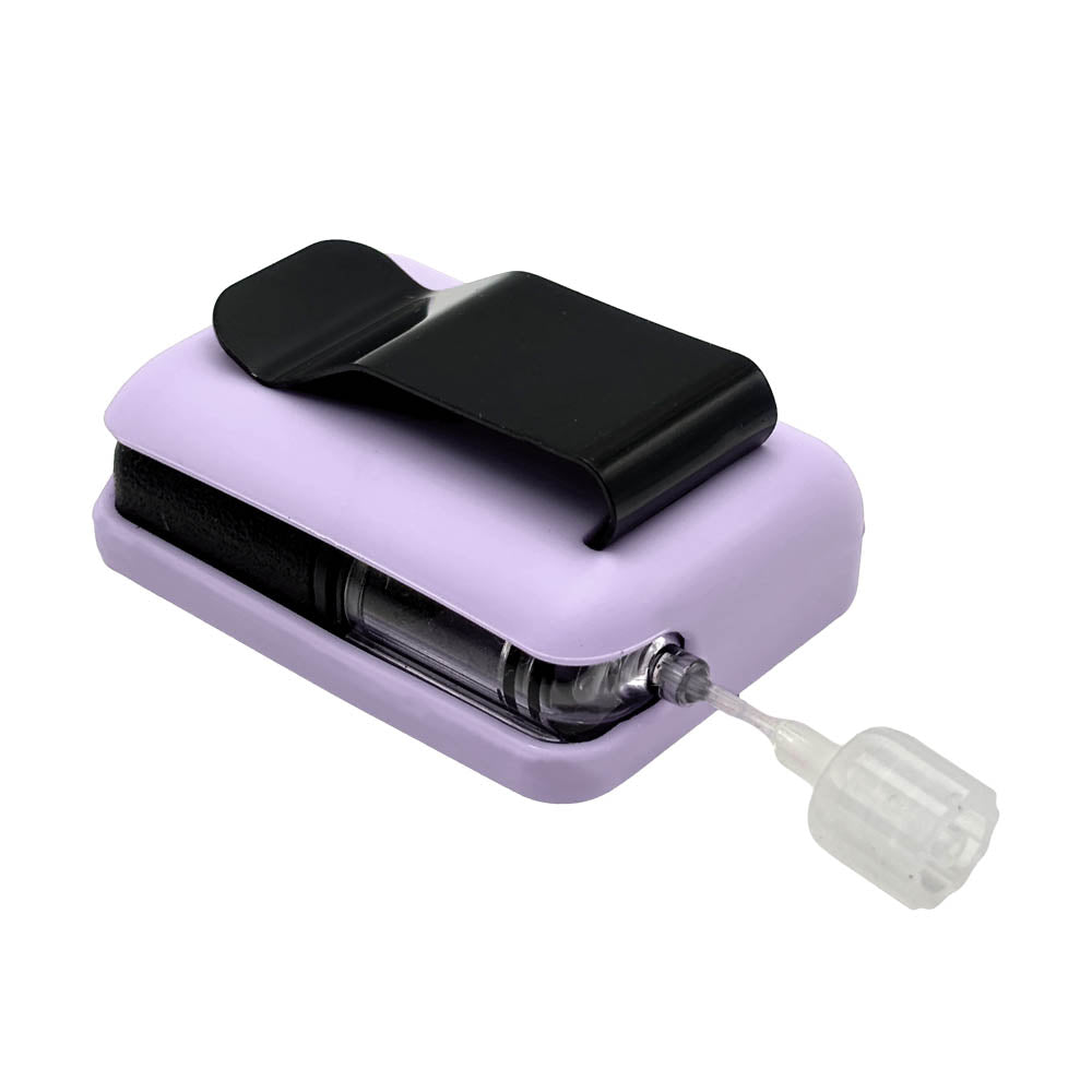 Lavender Tandem Mobi EZ-To-Charge Clip with Mobi insulin pump inside the case, lying flat on a surface.