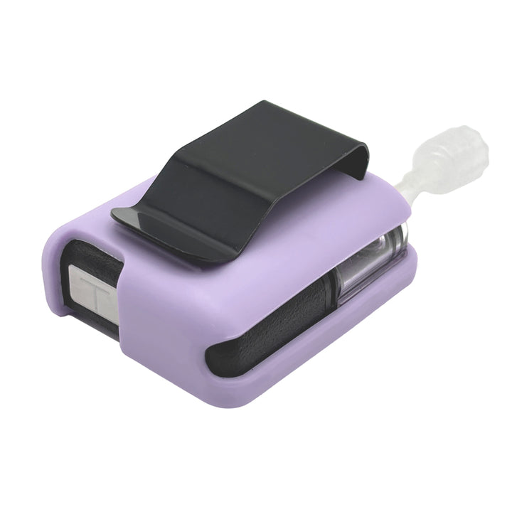 Lavender Tandem Mobi EZ-To-Charge Clip with Mobi insulin pump inside the case, lying flat on a surface.