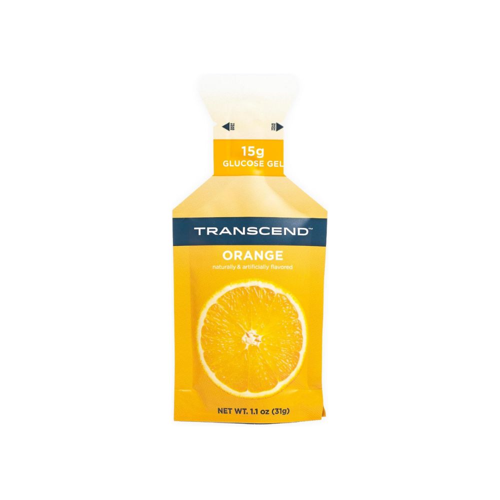 A package of Transcend Glucose Gel in the flavor Orange featuring vibrant orange and white colors, with the product name "Transcend" prominently displayed at the top. The words "Glucose Gel" and "Orange" are featured on the front. The gel packaging is small, compact, and easy to squeeze, with clear instructions on usage visible on the back.