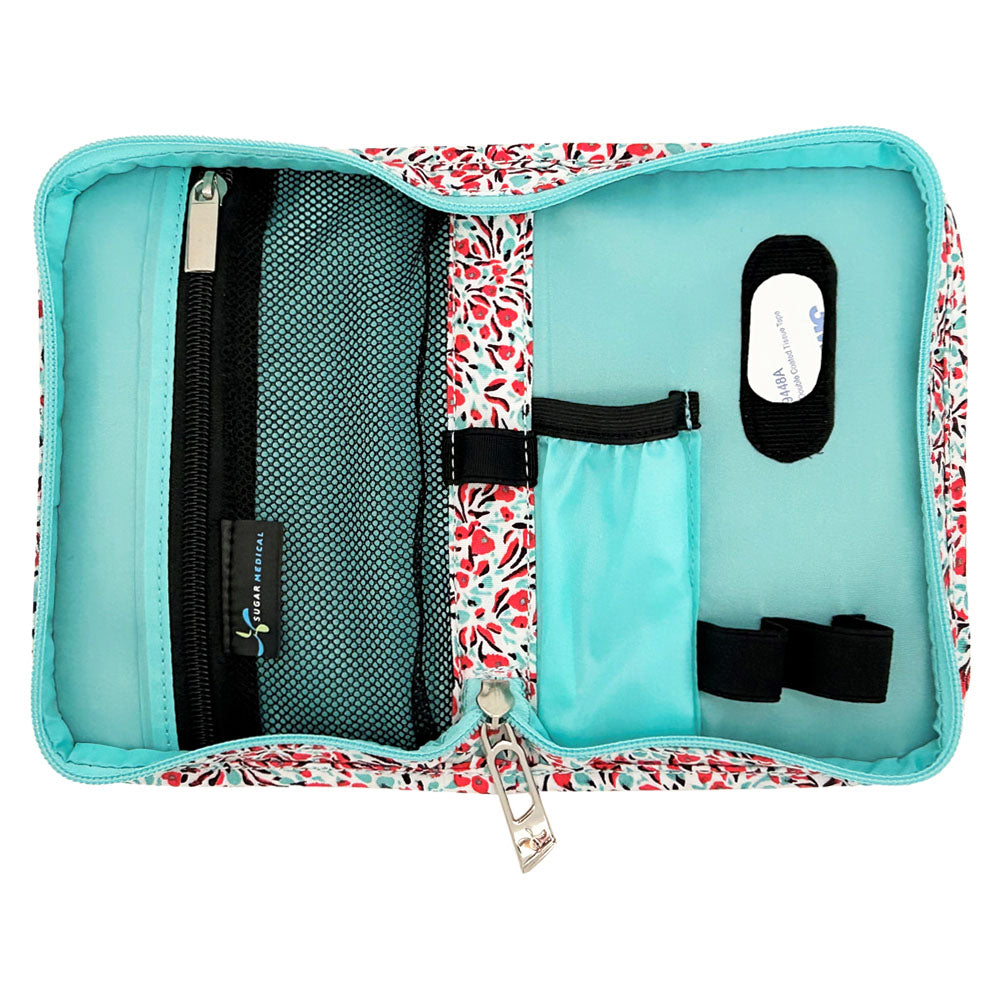 Sugar Medical Diabetes Supply Case II white with teal and red mini flowers inside with pockets and loops to organize your diabetic supplies. 