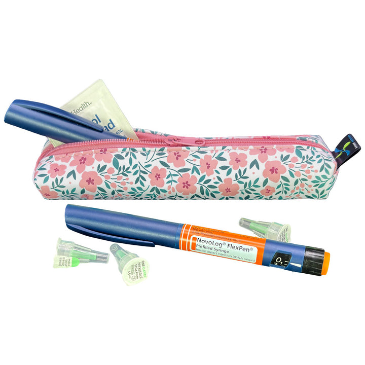 Floral-patterned MedMate GLP-1 / Insulin Pen Case with a blue zipper open with insulin pen coming out. 