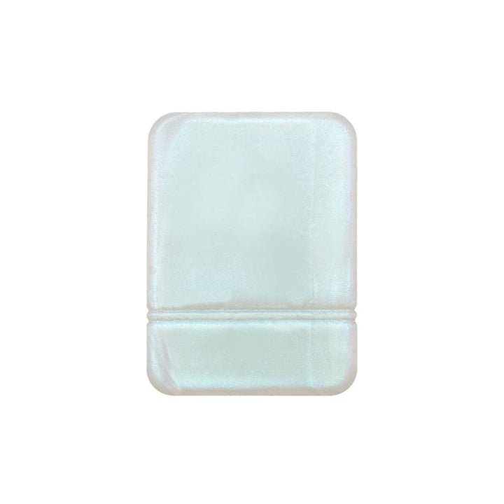 The back of white shimmer Mobi Tandem gel skin covers to protect insulin pump.