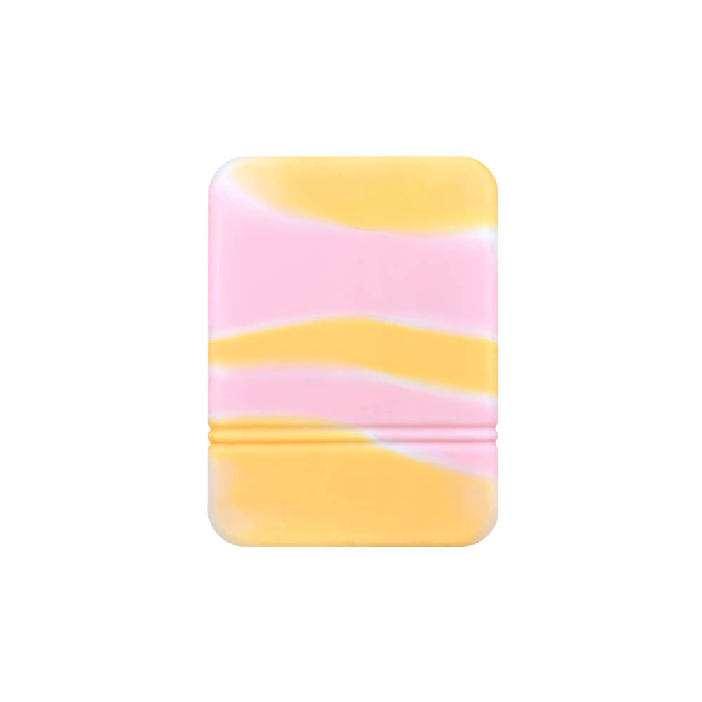 The back of white, pink and orange sorbet colored Mobi Tandem gel skin covers to protect insulin pump.