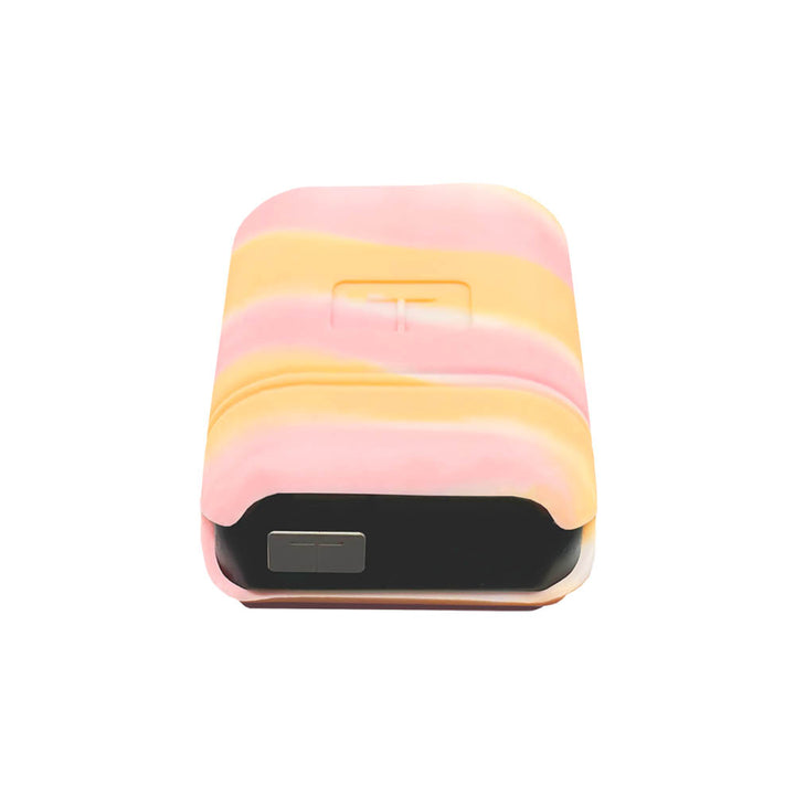 Bottom of the white, pink and orange sorbet colored Mobi Tandem gel skin with pump in it showing the button. 