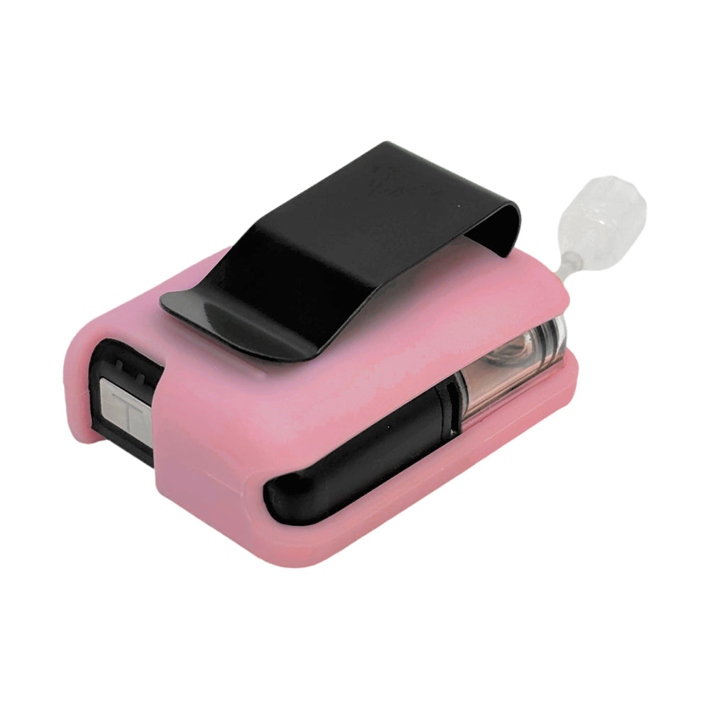 Pink Tandem Mobi EZ-To-Charge Clip with Mobi insulin pump inside the case, laying flat on a surface.