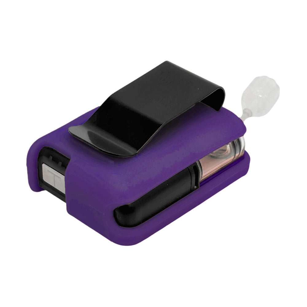Purple Tandem Mobi EZ-To-Charge Clip with Mobi insulin pump inside the case, laying flat on a surface.