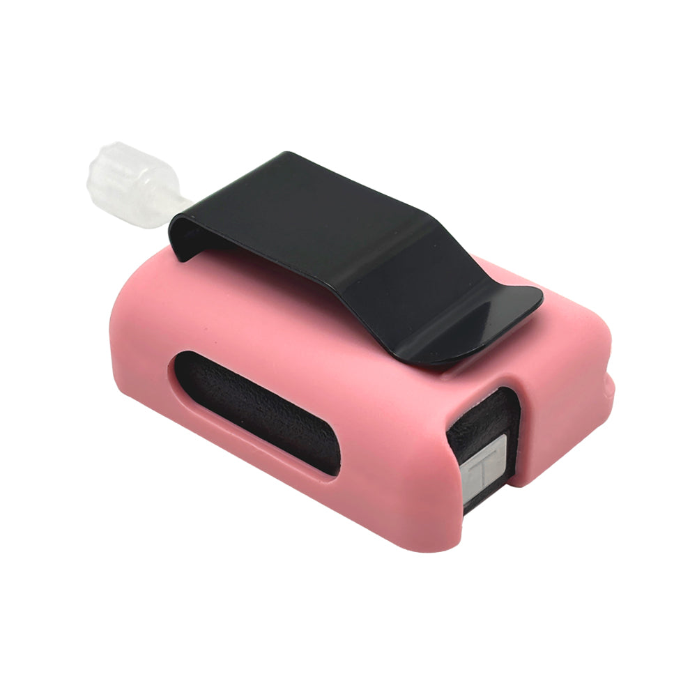 Pink Tandem Mobi EZ-To-Charge Clip with Mobi insulin pump inside the case, laying flat on a surface.