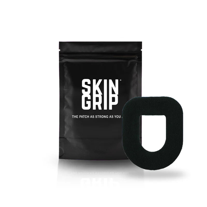 A black package that says Skin Grip containing the 20 adhesive patches and the black Omnipod adhesive patch around a white pod