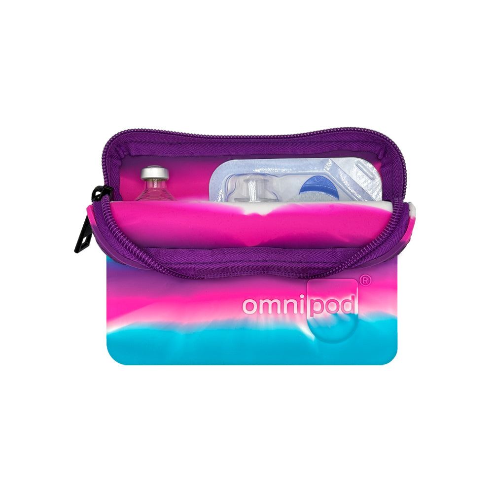 Set up with Omnipod® pod and insulin: The pink, purple, blue and white stripe Omnipod® protective travel case opened to reveal an Omnipod® insulin pod and an insulin vial placed inside, demonstrating the case's organized storage capabilities.