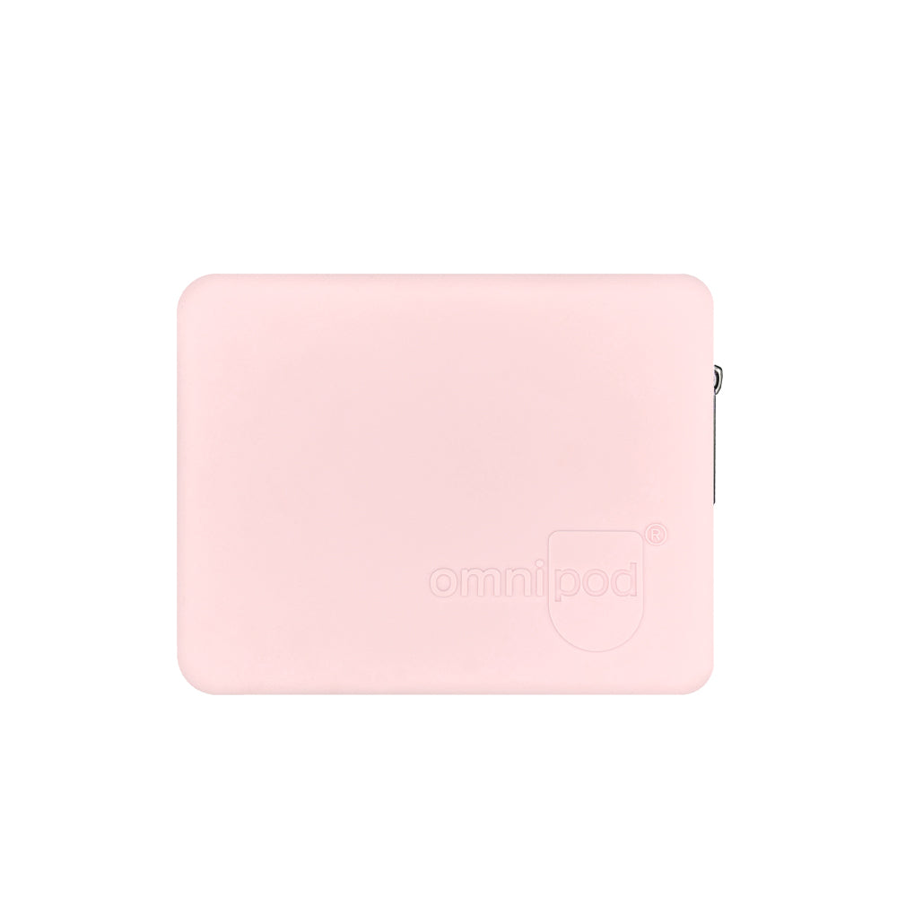 Front of the Omnipod® Protective Travel Case: A close-up view of the front of the light pink Omnipod® protective travel case, featuring a sleek, compact design with a zippered closure and the Omnipod® logo on the exterior.