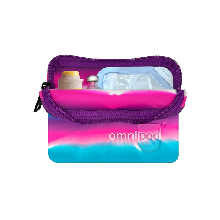 Set up with Omnipod® pod, insulin and Baqsimi nasal glucagon: The interior of the pink, purple, blue and white stripe Omnipod® protective travel case showing an Omnipod® pod, insulin vial and a Baqsimi nasal glucagon arranged neatly within the case.