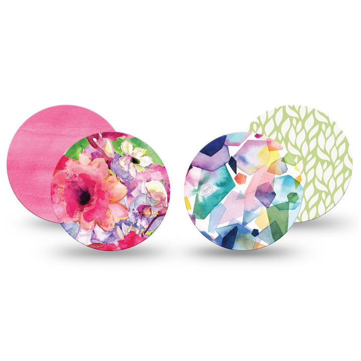 One of each of Expression Med Libre patch designs including Watercolor Red Flowers, Sage Greens, Kaleidoscope and Pink Horizon.