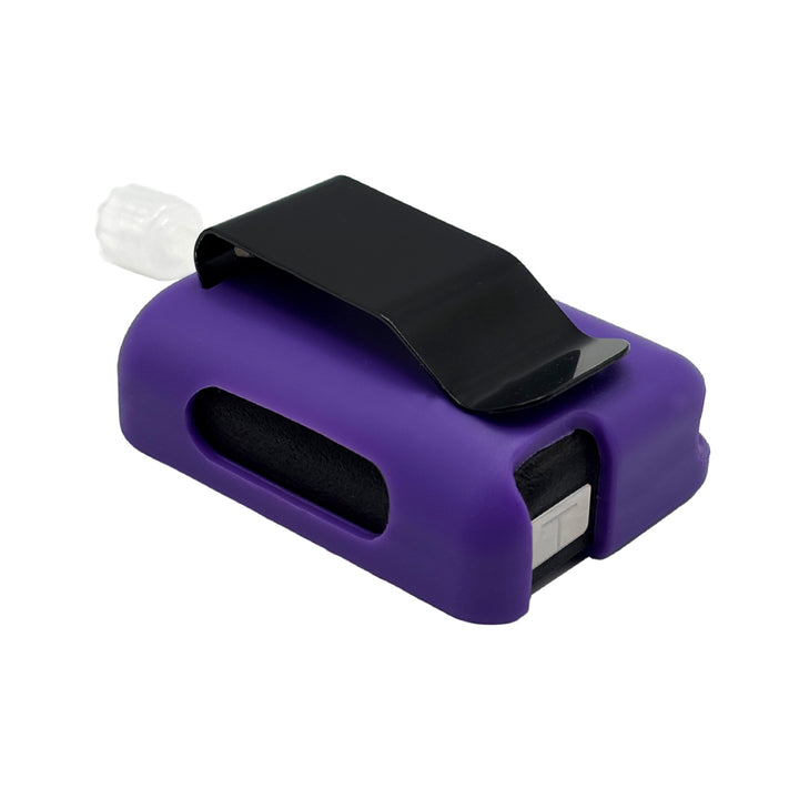 Purple Tandem Mobi EZ-To-Charge Clip with Mobi insulin pump inside the case, laying flat on a surface.