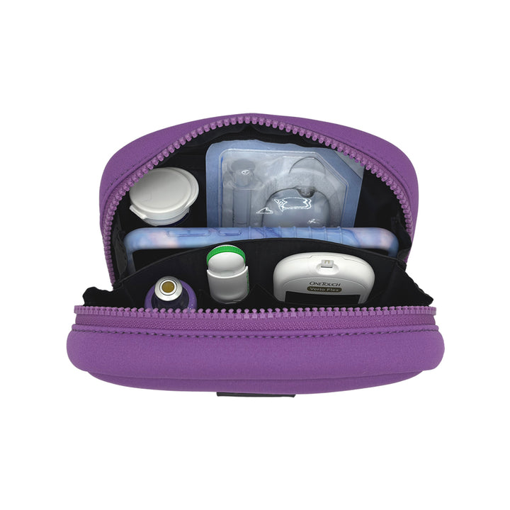 Open view of the Omnipod® Metro Supply Case in purple, displaying neatly organized Omnipod® PDM, pod, and other diabetes supplies inside the case.