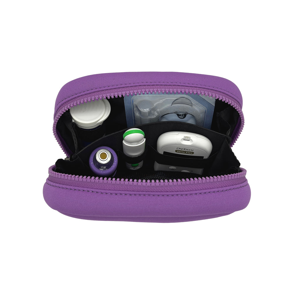 Open view of the Omnipod® Metro Supply Case in purple displaying neatly organized pod and other diabetes supplies inside the case.