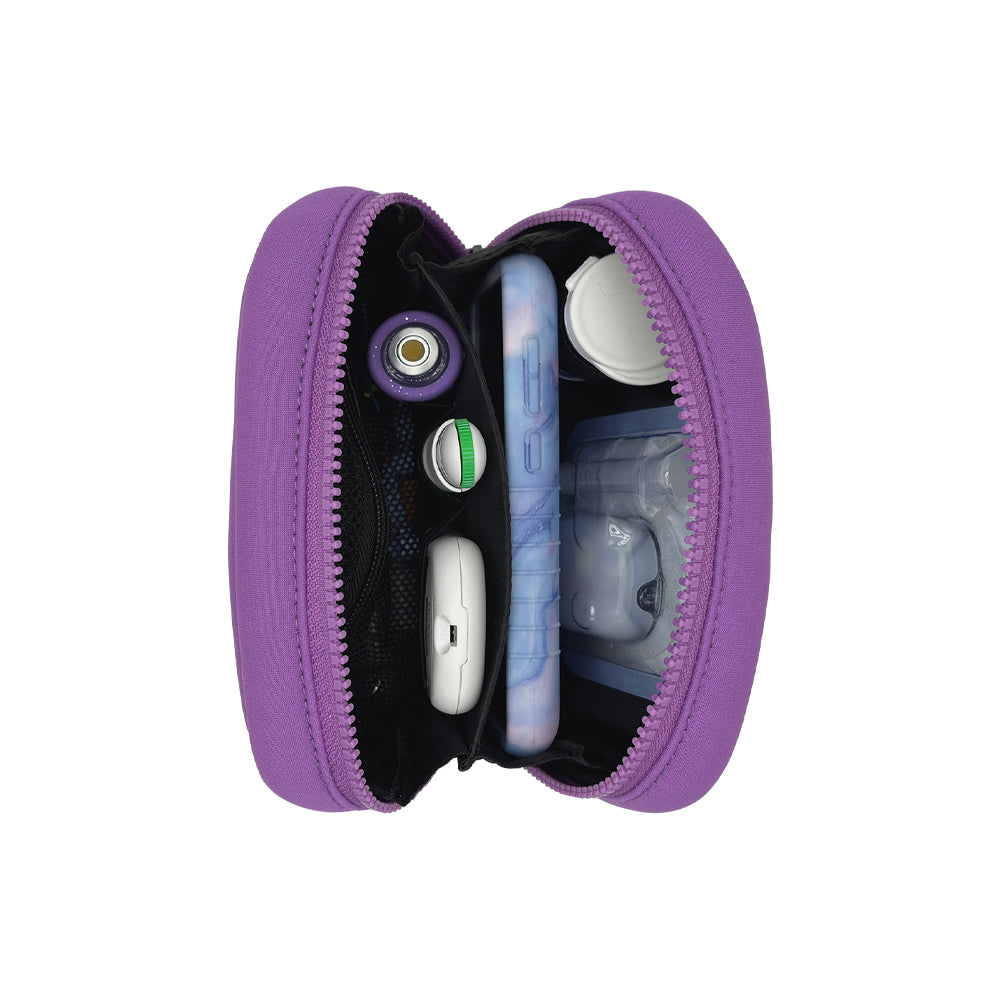 Vertical view of the Omnipod® Metro Supply Case in purple, displaying neatly organized pod and other diabetes supplies inside the case.