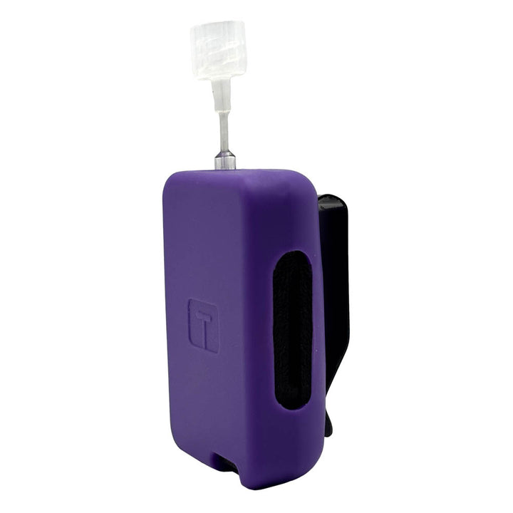Purple Tandem Mobi EZ-To-Charge Clip with Mobi insulin pump inside the case, standing straight up tilted to left. 