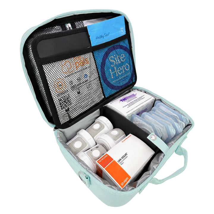 Diabetes Insulated Travel Bag in seafoam back compartment for site hero, Omnipod supplies, Dexcom, tac a way, podpals, and extra pods.