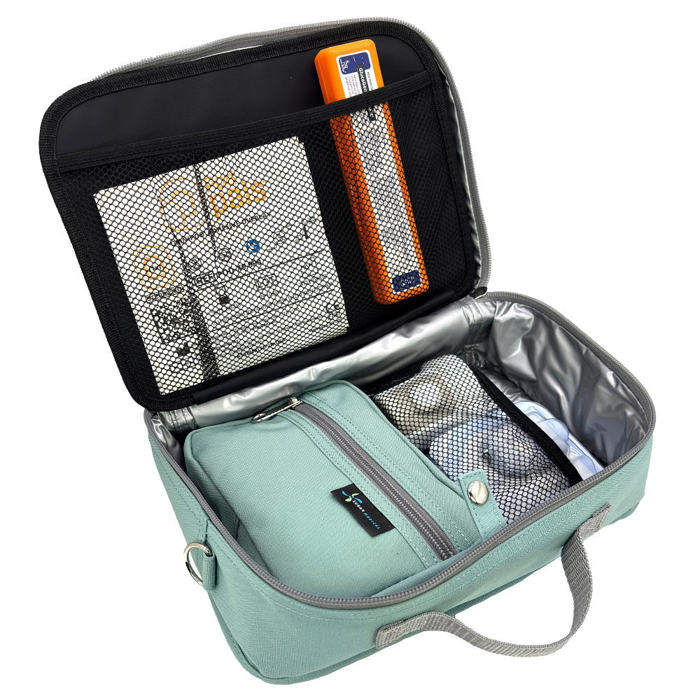Diabetes Insulated Travel Bag in pink seafoam compartment for a glucagon kit, Omnipod supplies, extra pods, snacks, glucose tablets, and includes a removable pouch. 