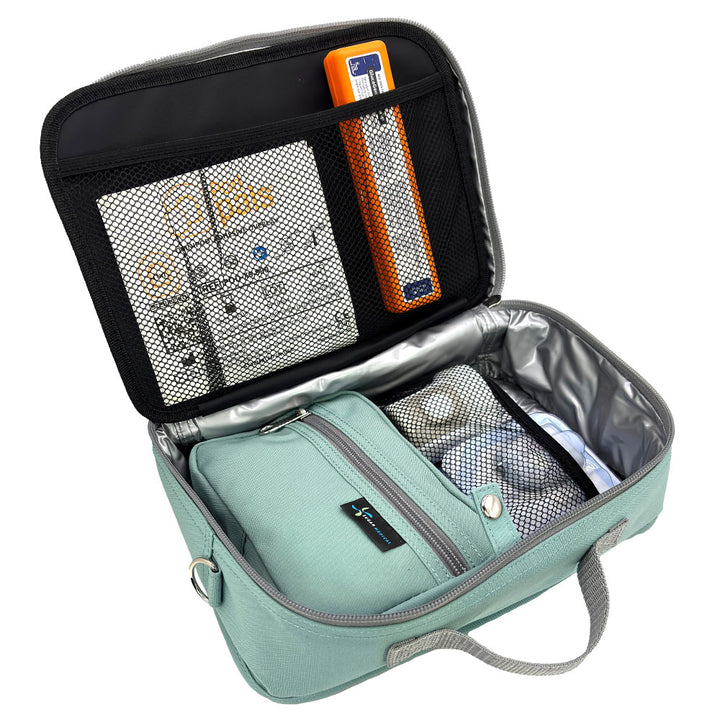 Diabetes Insulated Travel Bag in pink seafoam compartment for a glucagon kit, Omnipod supplies, extra pods, snacks, glucose tablets, and includes a removable pouch. 