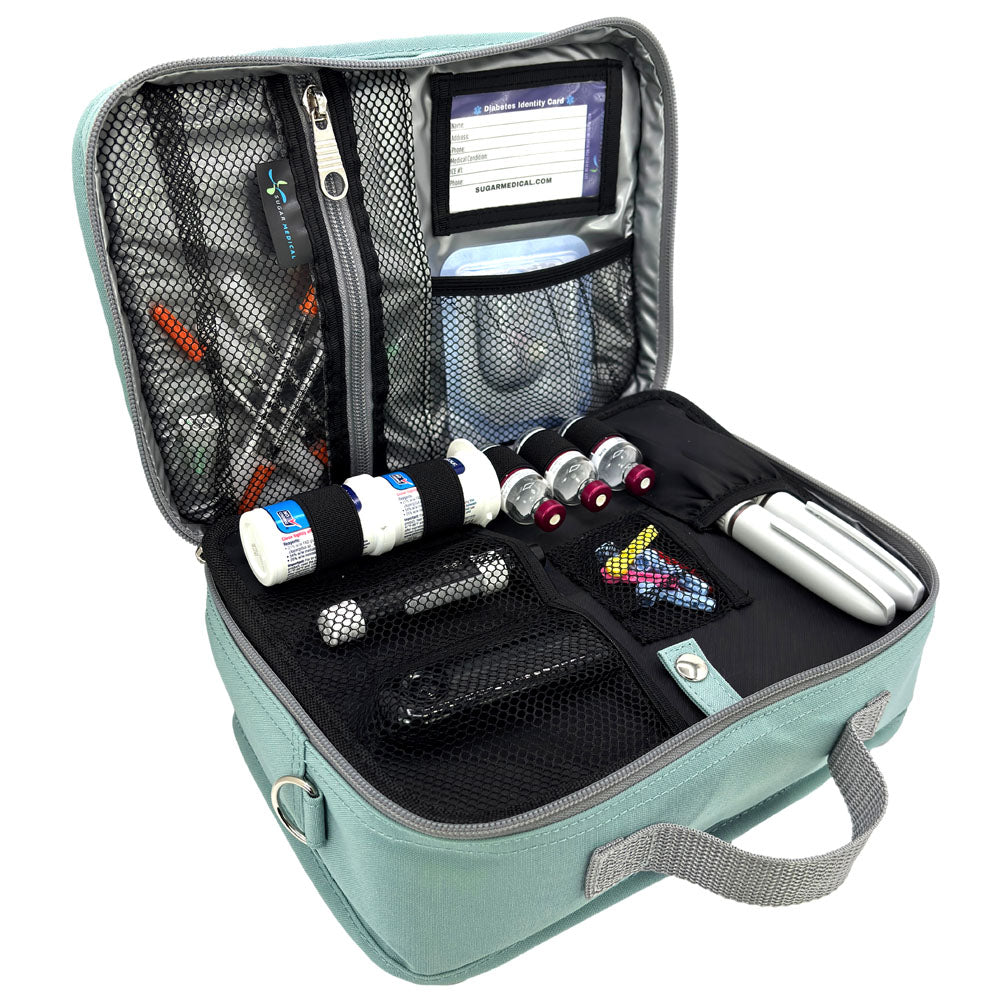 Diabetes Insulated Travel Bag in pink seafoam front section has pockets for glucose meter and lancing device and loops for insulin vials and pocket for insulin pens.