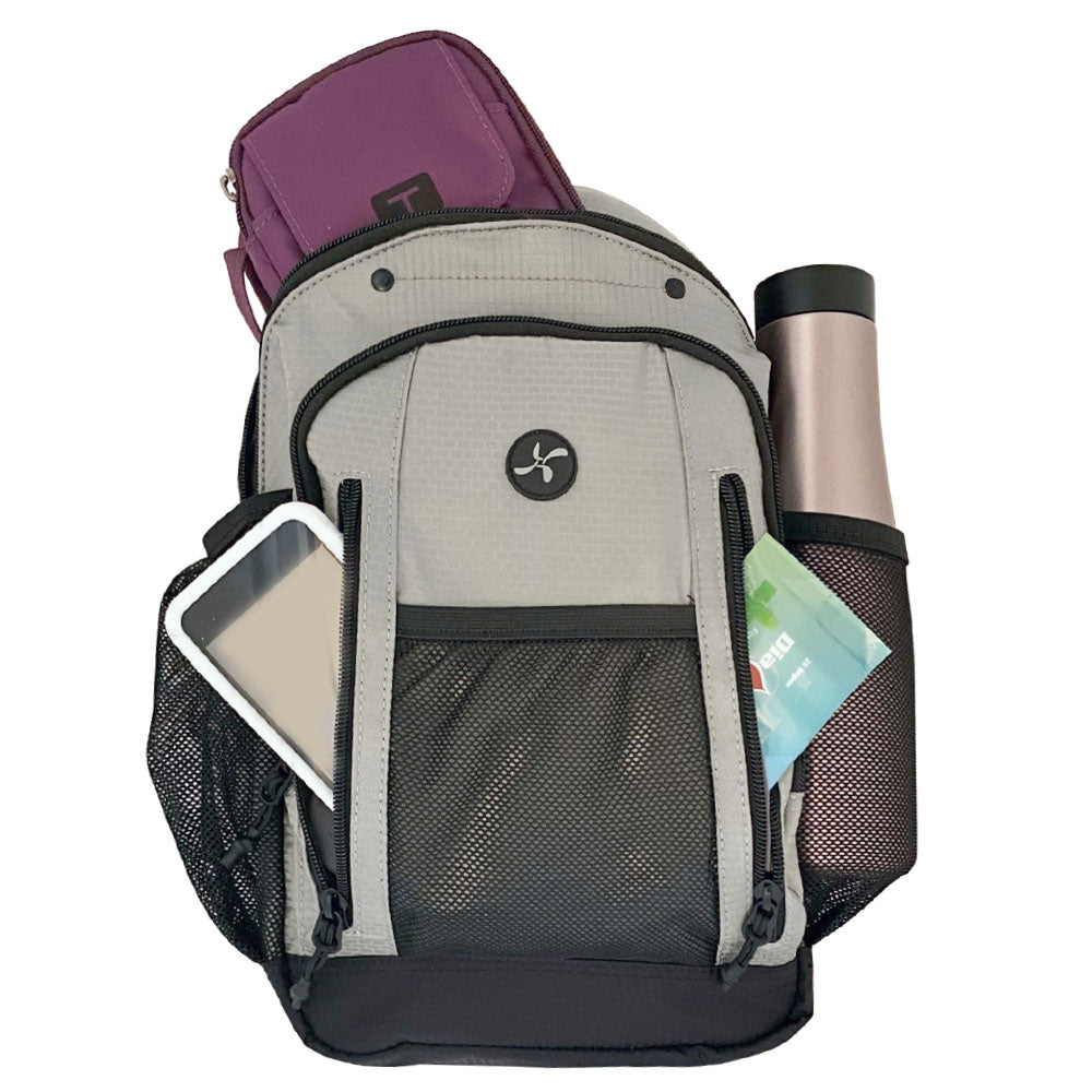 Diabetes Insulated Sling Backpack in grey front zippered pocket with Omnipod 5 PDM, insulated back with diabetic supply case and water bottle inside mesh pocket. 