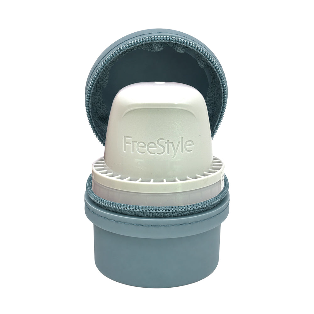 Freestyle device in a steel blue Libre 3 Travel Protective case on a white background.