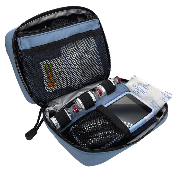 The back section has a mesh pocket with Omnipod pump supplies and three loops to secure three insulin vials.