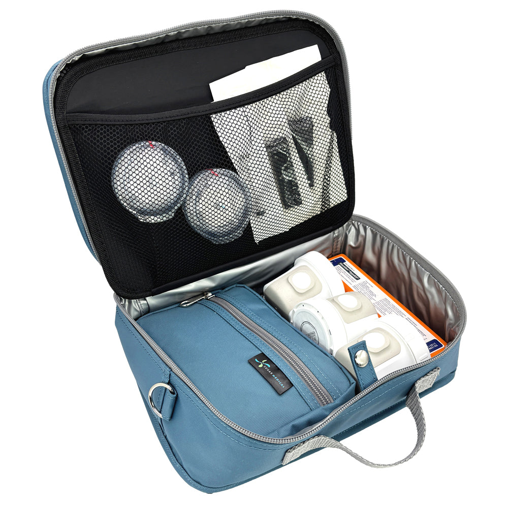 Diabetes Insulated Travel Bag in steel blue back compartment for a glucagon kit, Tandem supplies, Dexcom, snacks, glucose tablets, and includes a removable pouch.