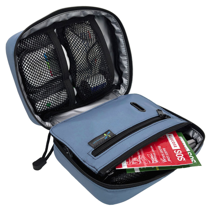 The front section of the steel blue diabetes organizer has three mesh pockets to secure your diabetic supplies