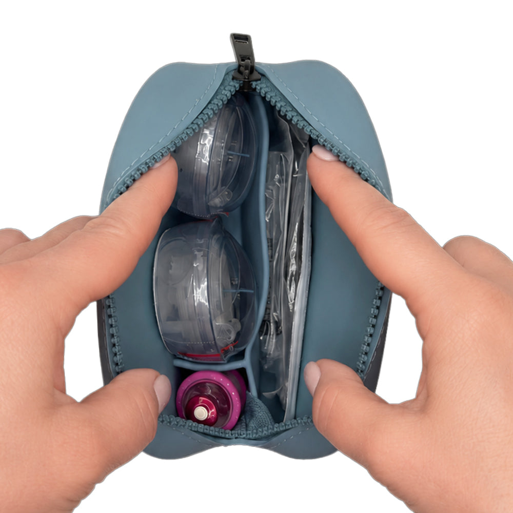 Steel Blue Tandem Protective Travel Case with Tandem supplies, held open by hands on a white background