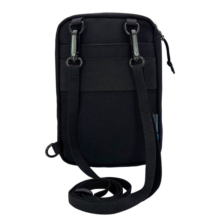 Back of a Black tandem diabetes supply case with a strap on a white background