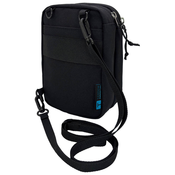 Black tandem diabetes supply case with a strap on a white background