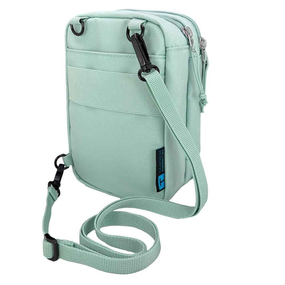 Seafoam tandem diabetes supply case with a strap on a white background