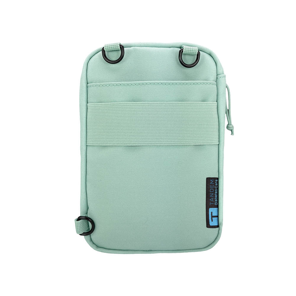 Back of Seafoam tandem diabetes supply case with a visible brand logo on a white background