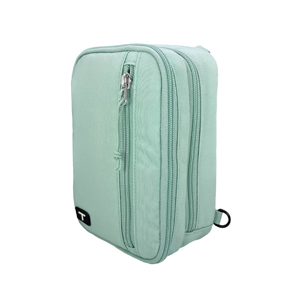 Seafoam tandem diabetes supply case with a zipper on a white background