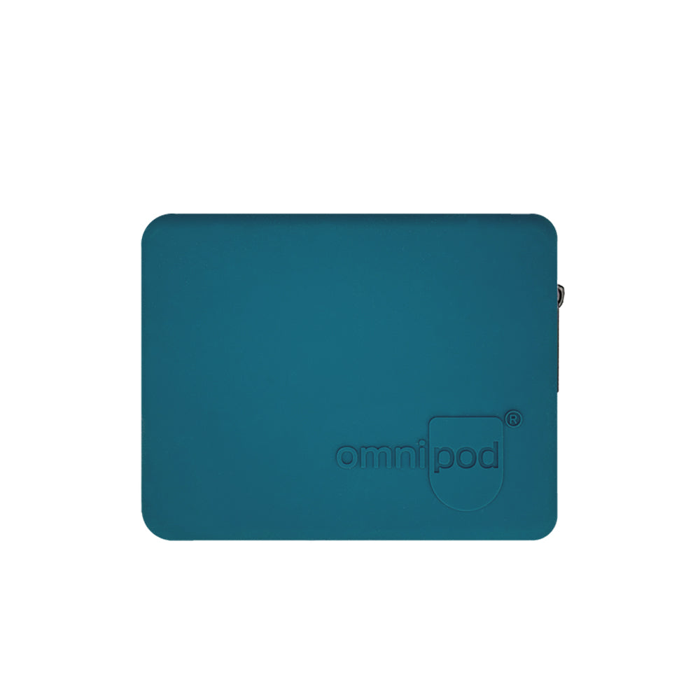 Front of the Omnipod® Protective Travel Case: A close-up view of the front of the steel blue Omnipod® protective travel case, featuring a sleek, compact design with a zippered closure and the Omnipod® logo on the exterior.