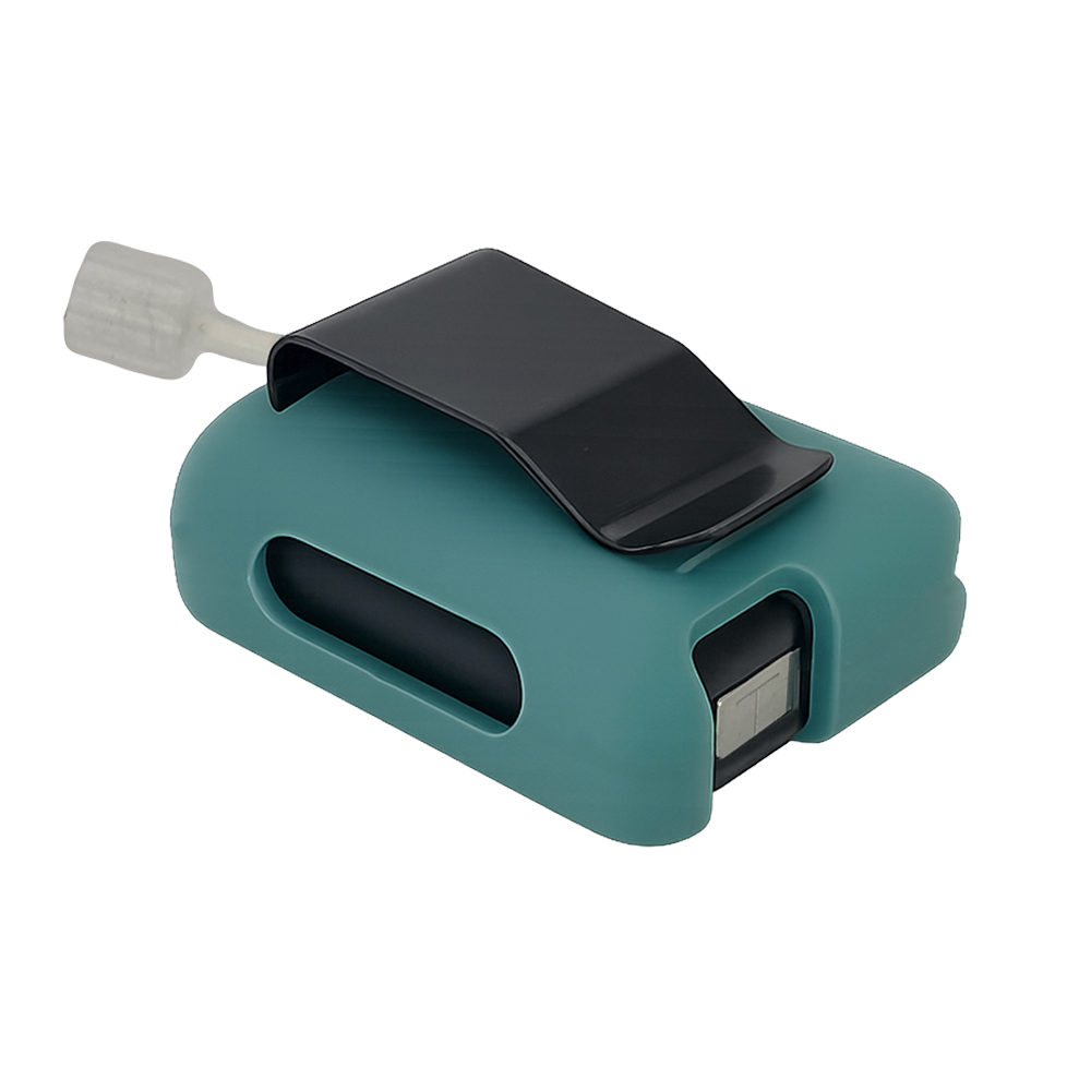 Teal Mist Tandem Mobi EZ-To-Charge Clip with Mobi insulin pump inside the case, lying flat on a surface.