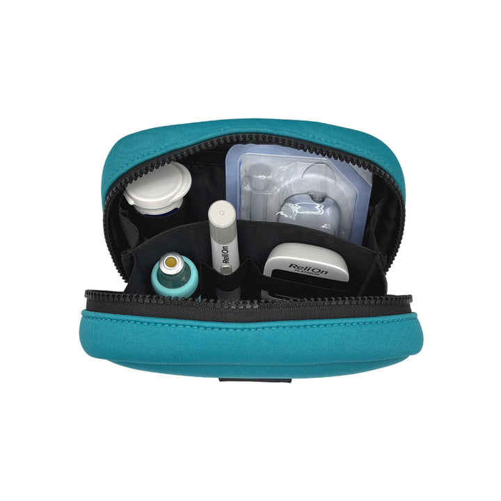 Open view of the Omnipod® Metro Supply Case in teal, displaying neatly organized pod and other diabetes supplies inside the case.