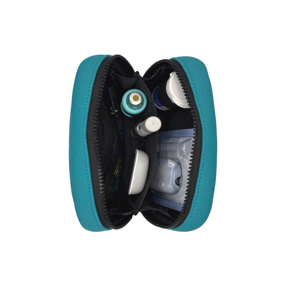 Vertical view of the Omnipod® Metro Supply Case in teal, displaying neatly organized pod and other diabetes supplies inside the case.