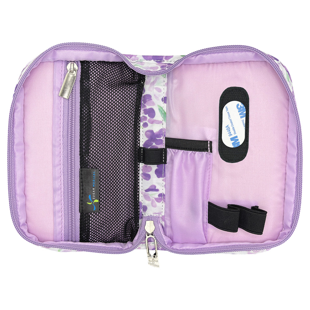 Purple Diabetes Supply Case open with pockets and loops to organize your diabetes supplies. 