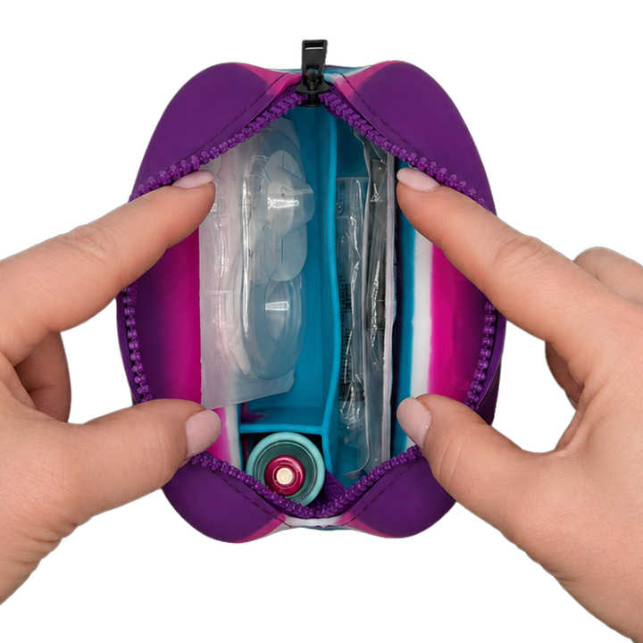 Aqua Tandem Protective Travel Case with Tandem supplies, held open by hands on a white background