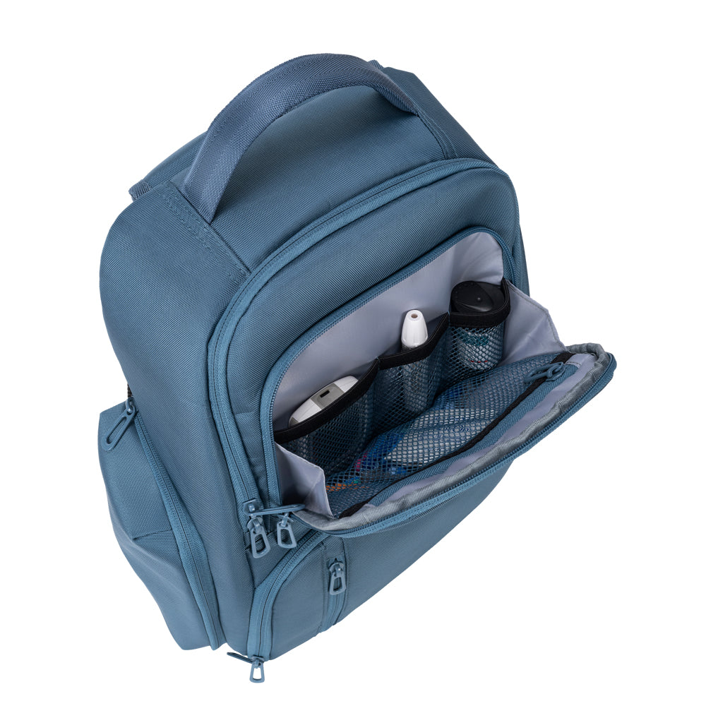 Steel Blue Travel Backpack front pocket open filled with diabetic testing supplies. 