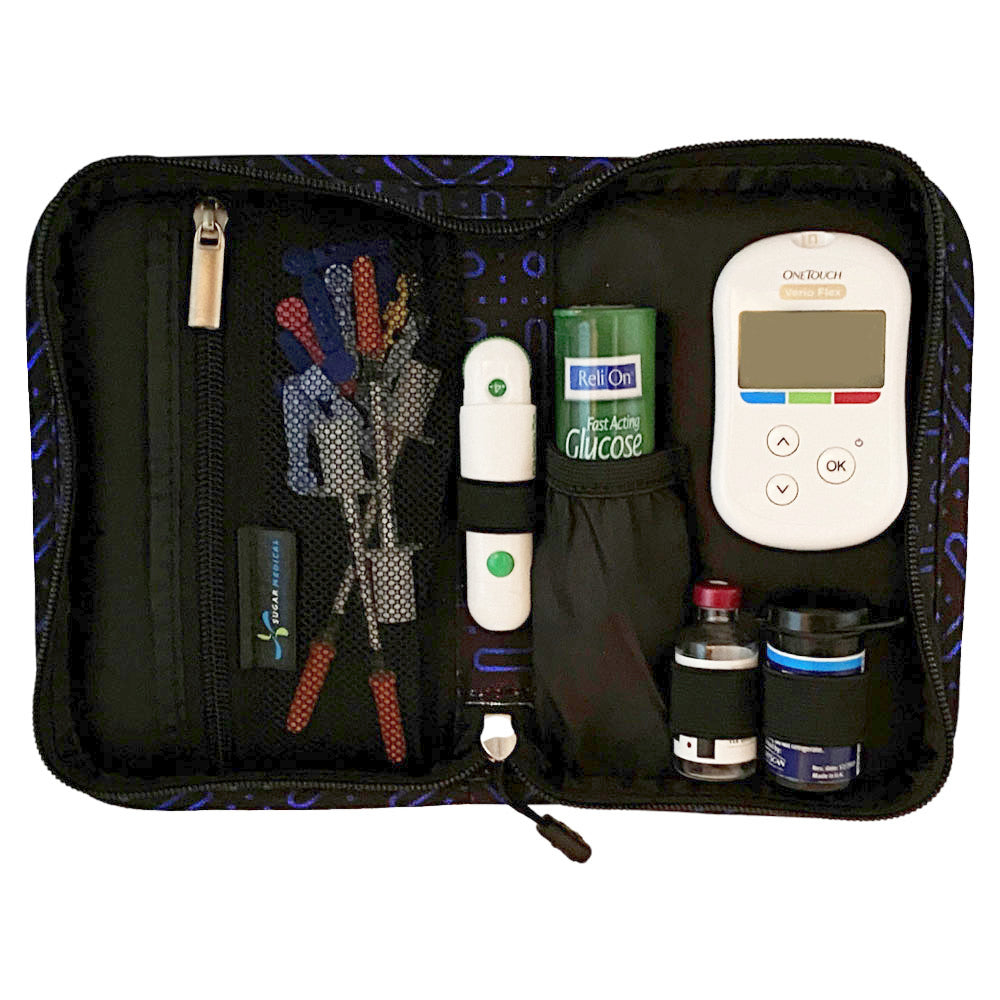Sugar Medical Diabetes Supply Case II black with blue dot pattern inside set up with glucose meter, test strips, lancet, and glucose tabs. 