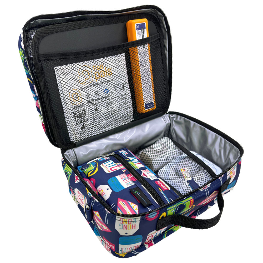 Back insulted section of the Vaca All Day diabetes travel bag organized with a glucagon, podpals, Dexcom G7, pods, and extra insulated supply pouch in it. 