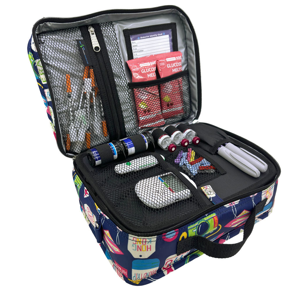 Front insulted section of the Vaca All Day diabetes travel bag organized with glucose melts, syringes, test strips, insulin vials, insulin pens, glucose meter and lancet. 