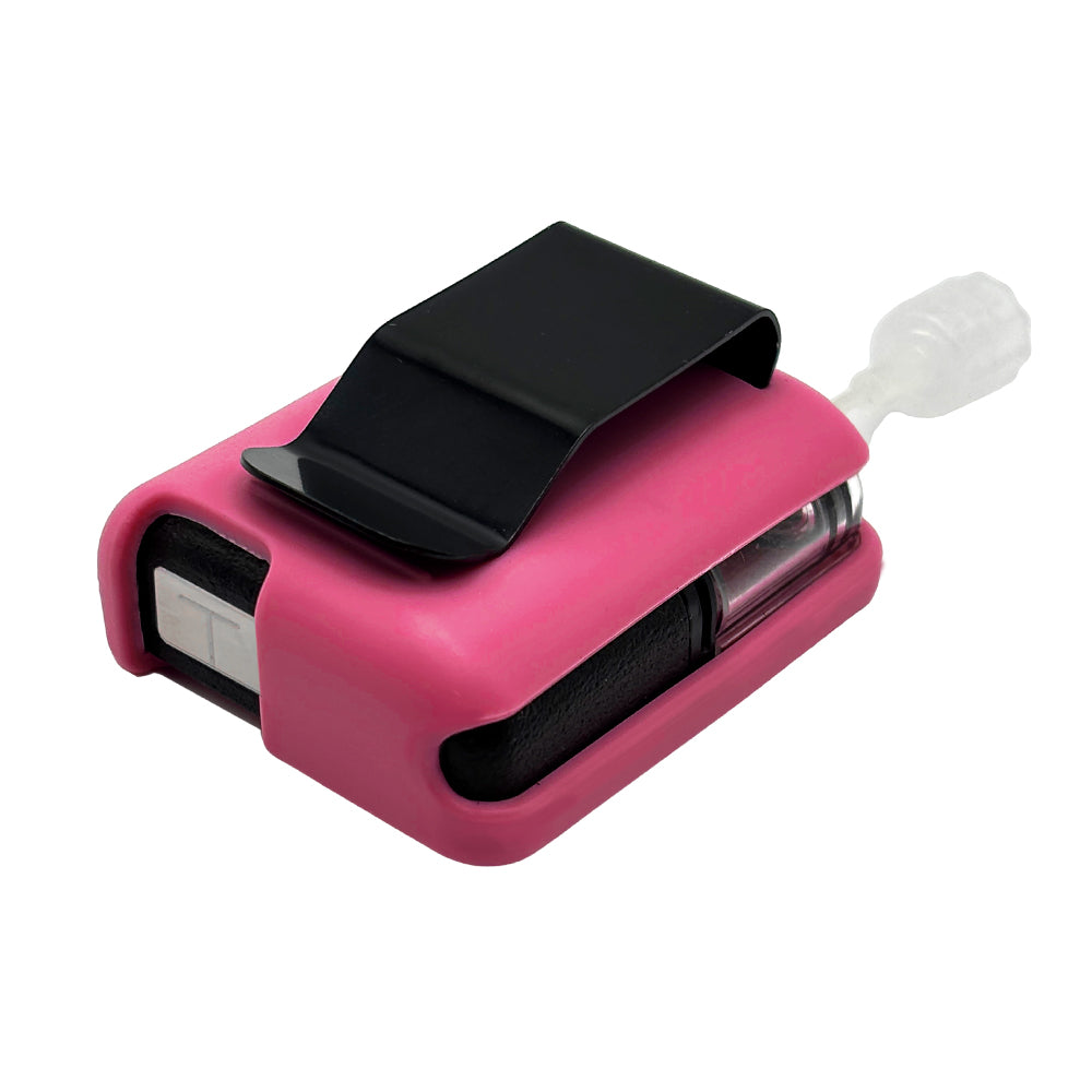 Very Berry Tandem Mobi EZ-To-Charge Clip with Mobi insulin pump inside the case, lying flat on a surface.