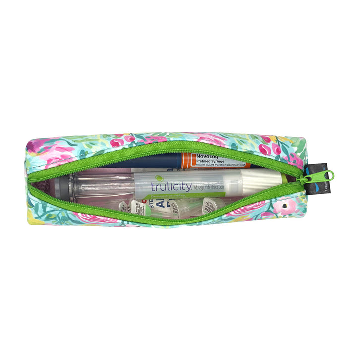 Floral-patterned slim case open with an insulin pen and GPL-1 pen and pen tips in it. 