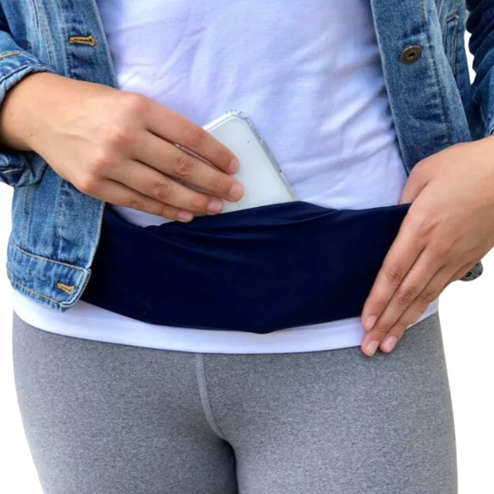 Woman wearing a Navy Bandi Wear Pocket Belt filled with supplies, demonstrating its stylish and functional design for carrying essentials hands-free.