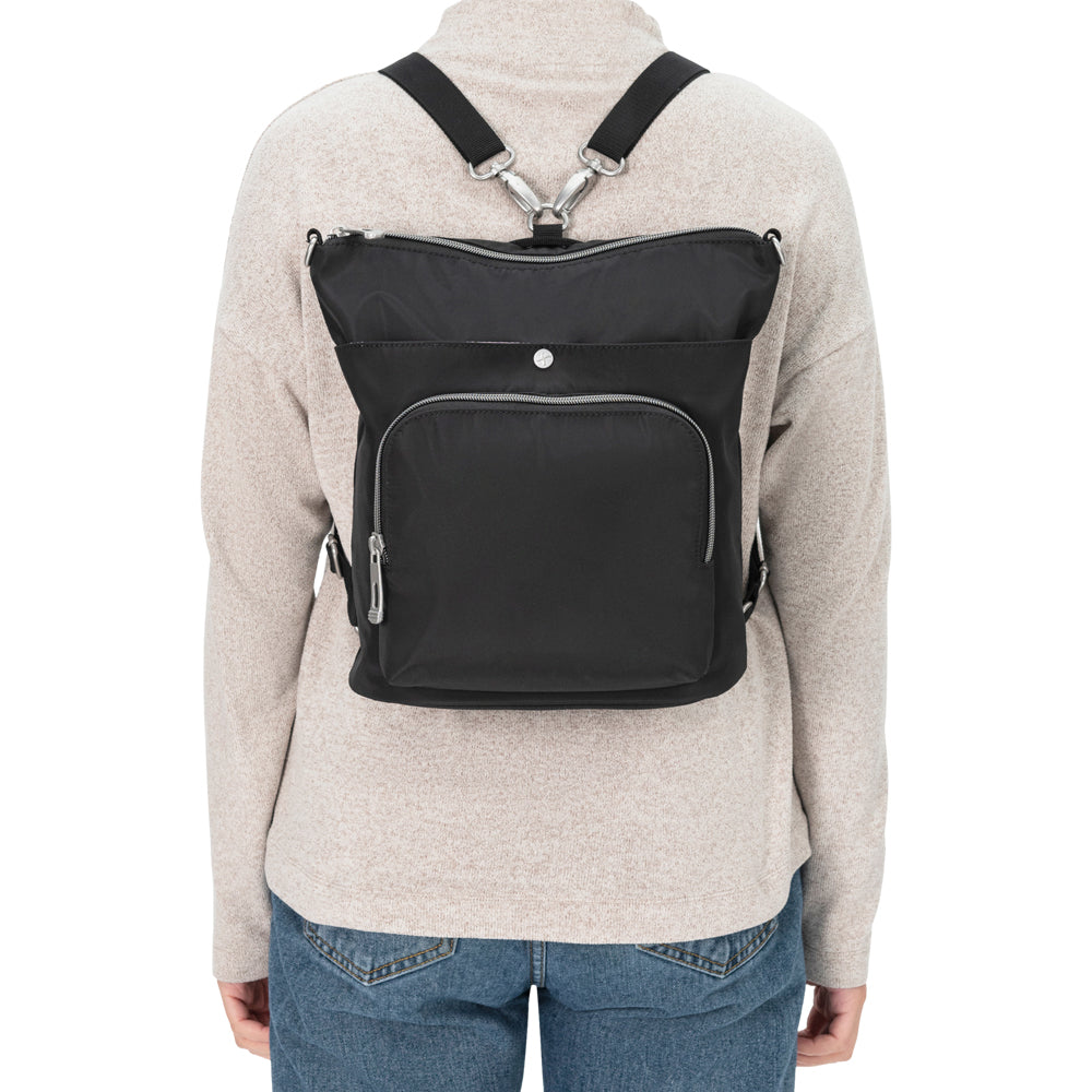 Women wearing Diabetes Nylon Backpack in black on back with two straps. 